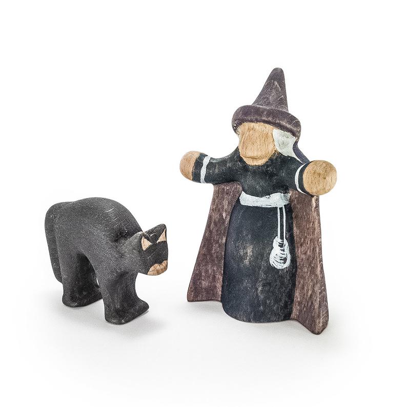 wooden toy witch with black cat